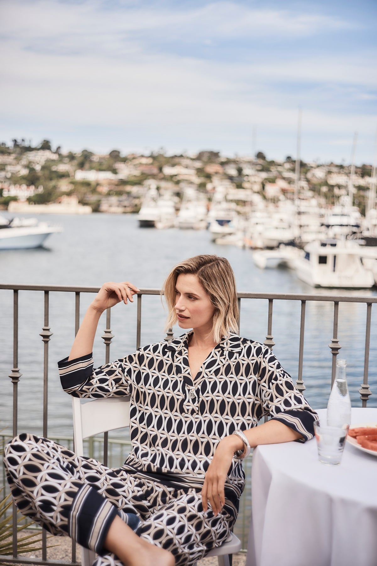 WIDE-LEG TROUSERS MADE FROM RECYCLED FABRIC WITH A GEOMETRIC PRINT