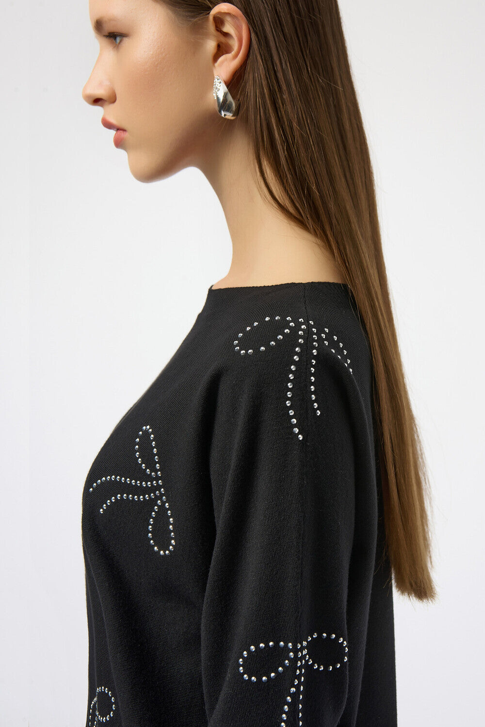 Pull à ornements bijoux