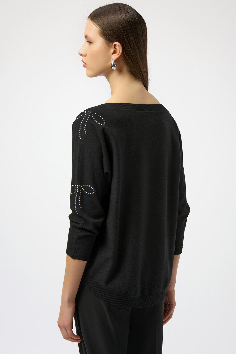 Pull à ornements bijoux